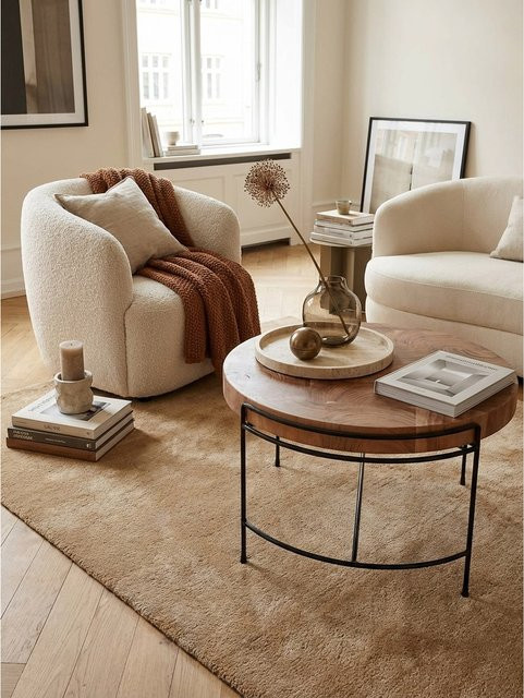 Runder Couchtisch aus Akazie Massivholz und Metall in Braun im Industrial Design von KADIMA DESIGN, H x B x T: 62 x 40 x 62 cm - Bild 1