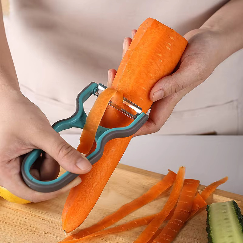 PDQ Edelstahlschäler in Silber mit drehbarer Klinge und ergonomischem Griff für Gemüse und Obst - Bild 2