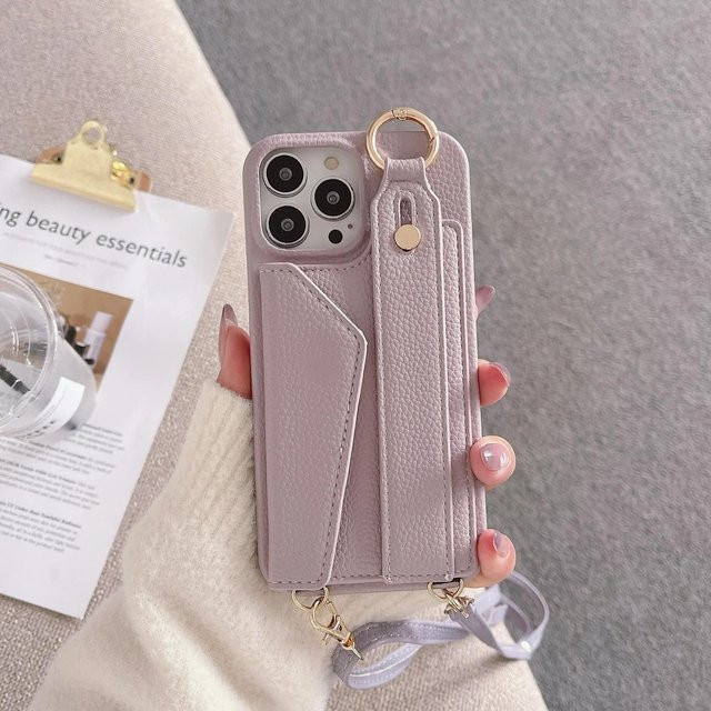 Yiran Lederhülle mit Handschlaufe, Ring und Kartenfach für iPhone 16, iPhone 15 Plus, iPhone 15 Pro Max und iPhone 16 Pro, Farbe: Lila - Bild 1