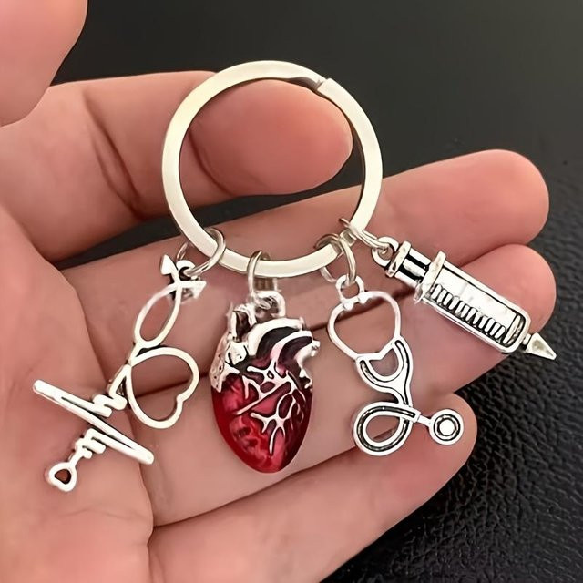 Schlüsselanhänger Messing, Silber, Unisex, Tropföl Herz Stethoskop - Bild 1