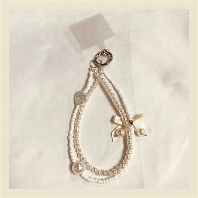 Modisches Handy Lanyard als kurzes Handgelenk-Schlüsselband mit Perlen-Bogen-Design und Doppelkette in Weiß - Bild 1
