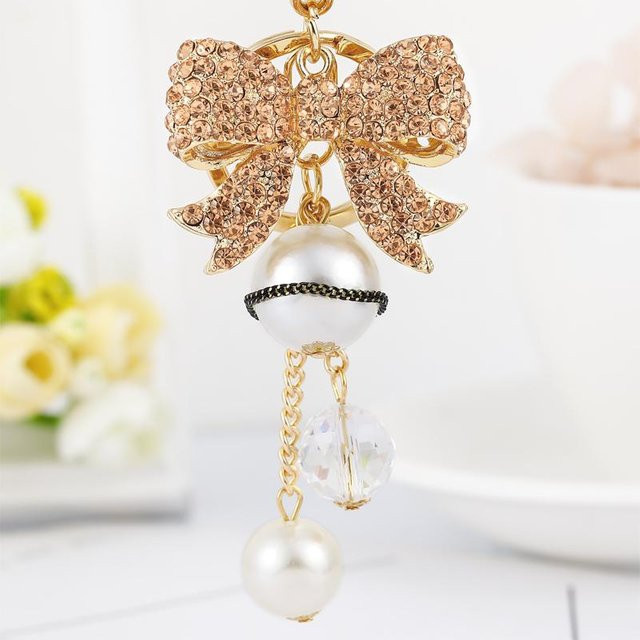 Easya Schlüsselanhänger, Schmetterlingsschleife, Glitzer, beige, Damen - Bild 1