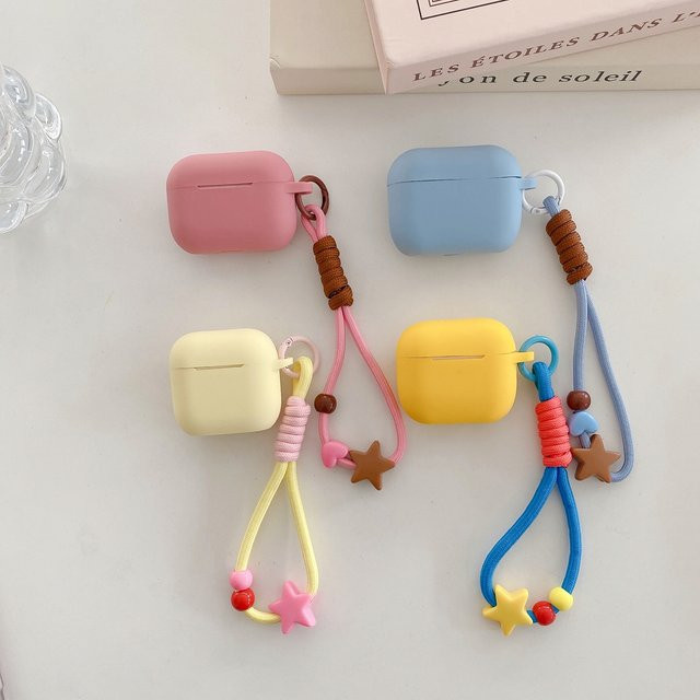 Apple AirPods Schutzhülle aus Silikon mit 3D-Sternen und Schlüsselband in Rosa, Blau und Gelb für AirPods 2 3 4 Pro Pro 2 Pro 3 - Bild 1