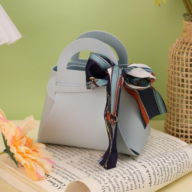 Luxuriöse Mini-Geschenktüte aus PU-Leder mit Schleifenband in Blau für Hochzeitsfeiern und Süßigkeiten-Verpackungen - Bild 1