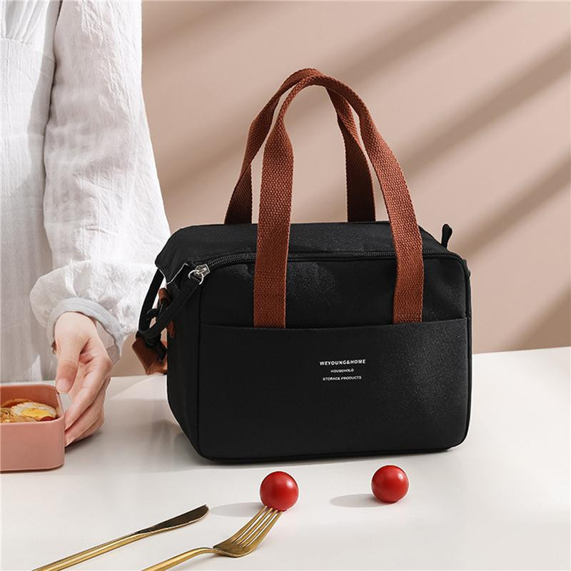 Wärmeisolierte Lunchbox von Yiran Furniture als tragbare Bento-Tasche in Schwarz und Grau - Bild 1