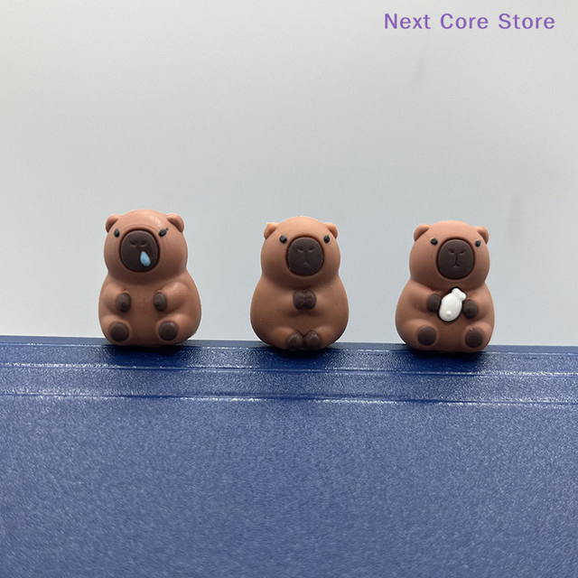 10 Stück Capybara Stiftaufsätze aus Silikon in Braun für Kinder und Schulbedarf - Bild 1