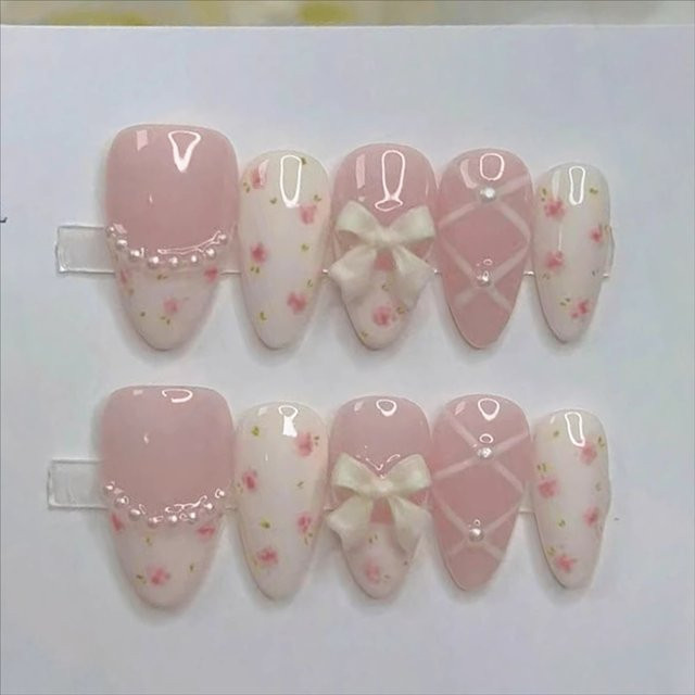 Qsezeny Press-on-Nägel, 10 Stück, rosa, mandelförmig, 3D-Schleifendesign - Bild 1