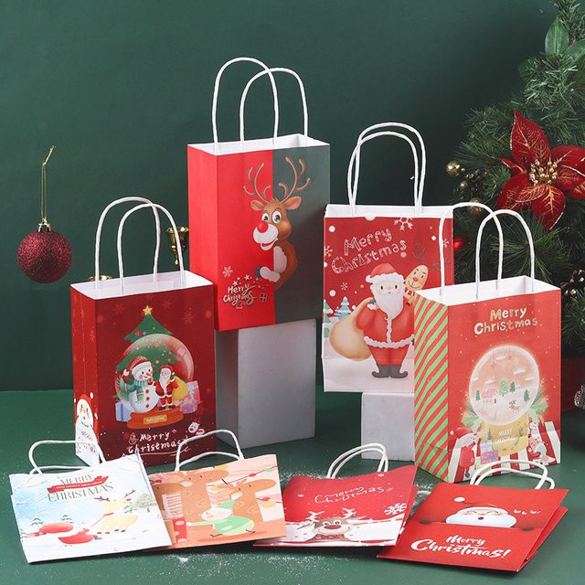 4er Set Weihnachtliche Geschenktüten mit Elch und Santa Claus Muster aus Papier für Süßigkeiten und Kekse - Bild 1