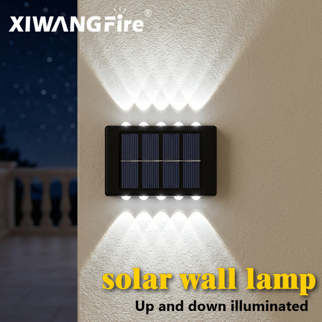 XIWANGFIRE Solar-LED-Wandleuchte in Schwarz mit Auf- und Abwärtsbeleuchtung, warmweißes Licht für Garten, Balkon und Terrasse - Bild 1
