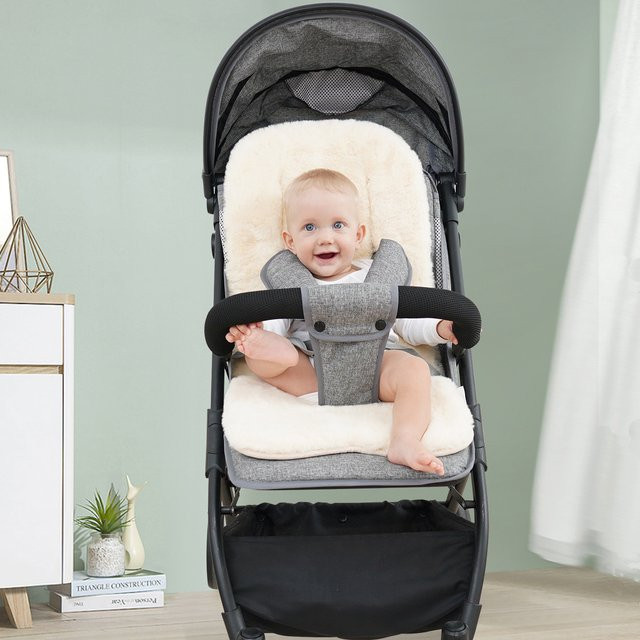 Komfortables Winter-Sitzkissen für Kinderwagen als weiche Sitzauflage in Schwarz und Weiß - Bild 1