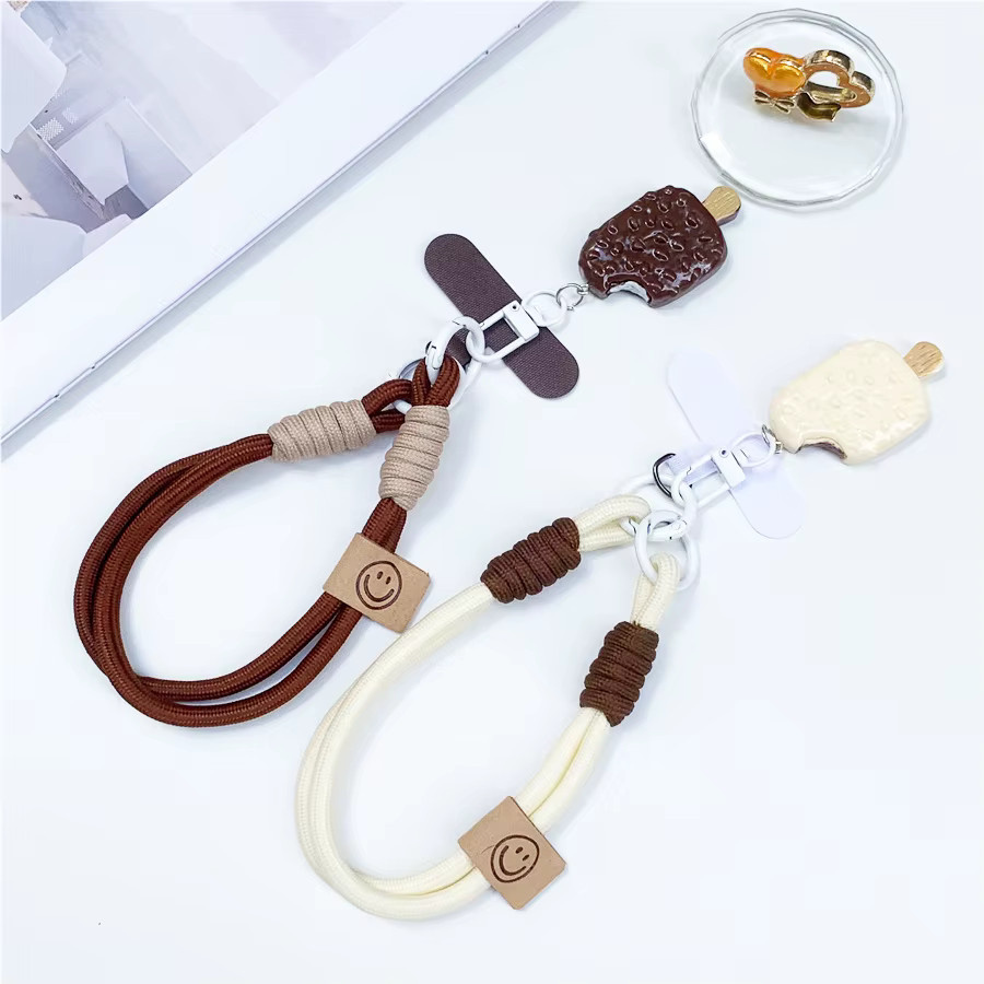 DOLANBIA Handy-Lanyard mit Eiscreme-Anhänger und Handschlaufe in Beige - Bild 1