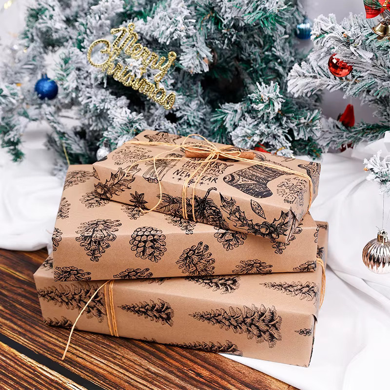 3M Weihnachtsgeschenkpapier aus Kraftpapier mit schwarzem Tannenzapfen und Glocken-Motiv, 3 Meter Rolle - Bild 3