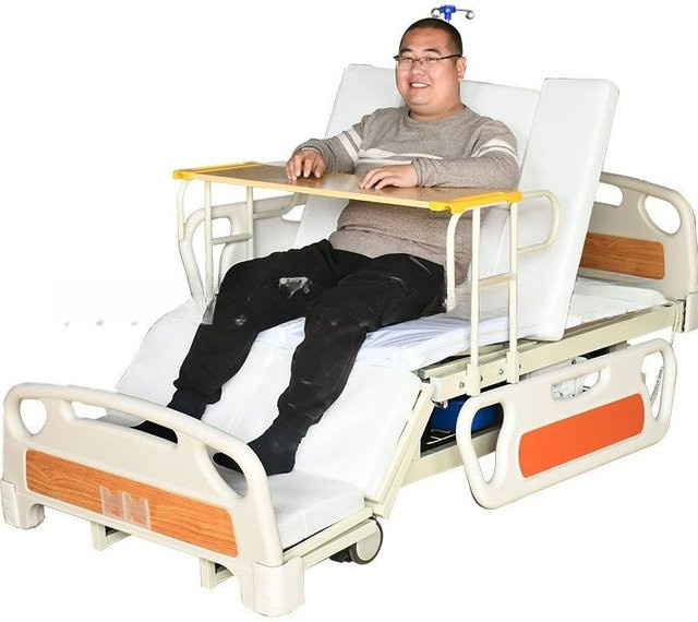 Elektrisches Multifunktionsbett für Senioren und Patienten in Weiß mit Hebefunktion, Drehfunktion und integrierter Leselampe - Bild 1