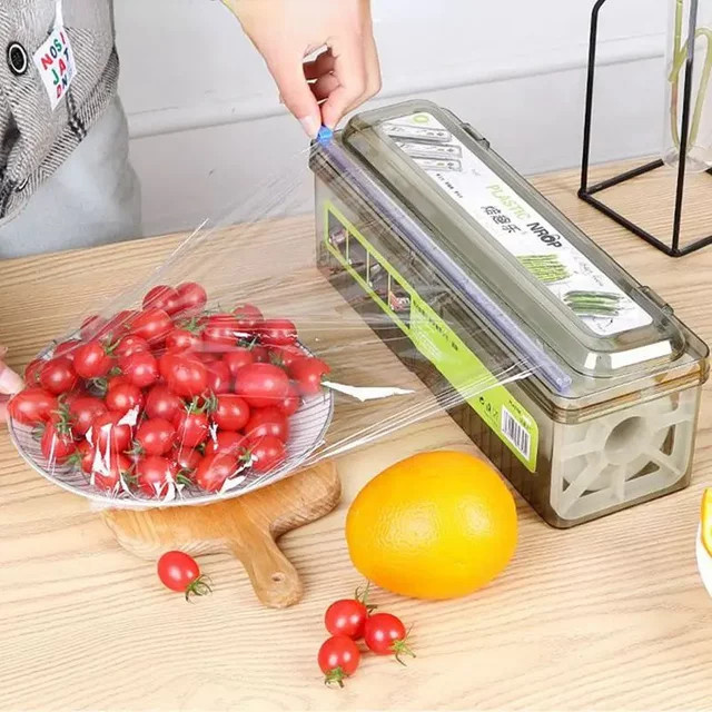 Transparenter Film Dispenser aus Kunststoff zum Schneiden und Aufbewahren von Aluminiumfolie und Frischhaltefolie für deine Küche - Bild 1