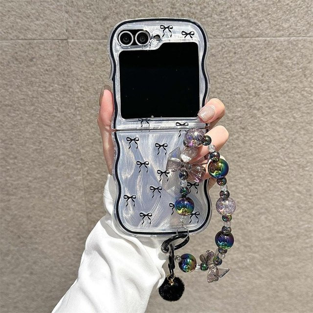 Niedliche Silikon Handyhülle mit Schleife und Kette für Samsung Galaxy Z Flip 6 5 4 3 in Transparent - Bild 1