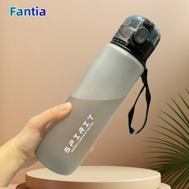 Auslaufsichere Sport Wasserflasche aus Kunststoff mit Skala in Rot und Transparent, 700 ml - Bild 1