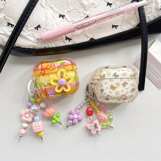 Bunte 3D-Blumen und Schmetterling Schutzhülle für Apple AirPods 2 3 4 Pro Pro 2 in Gelb mit Gittermuster - Bild 1