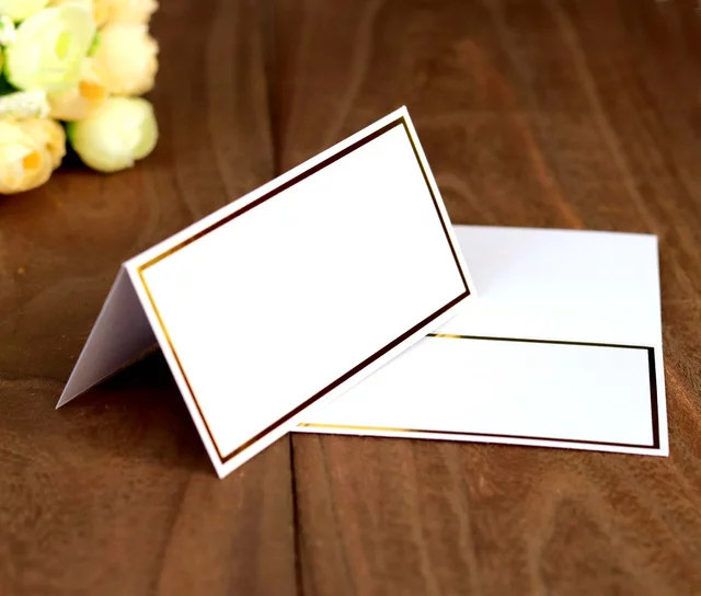 Goldene Tischkarten aus Papier für Hochzeiten und Geburtstage in Weiß und Gold - Bild 1