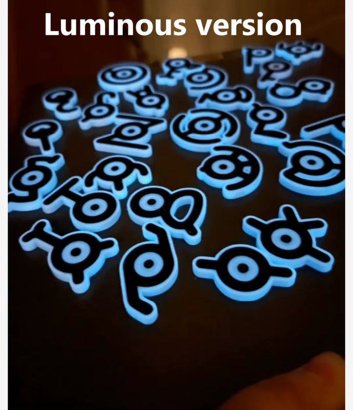 Pokemon Unown Figur Modell aus Kunststoff in Gold und Silber für deinen Desktop oder Kühlschrank - Bild 6