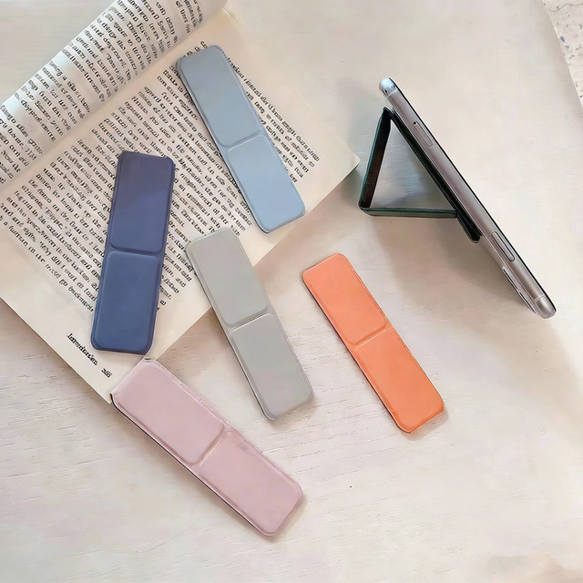 NMEGOU Magnetischer Handyhalter mit Handschlaufe und Push-Pull-Funktion in Rot für iPhone und Samsung - Bild 1