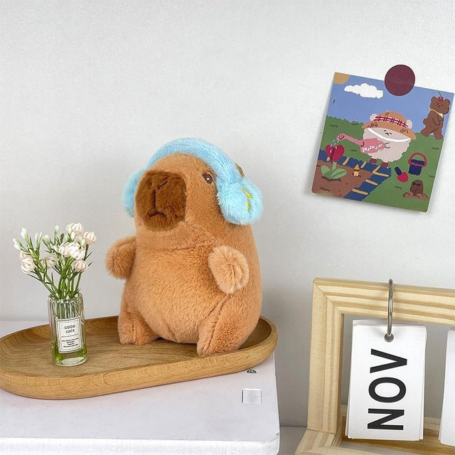 Capybara Plüschtier mit Kopfhörern, Puppe, Schlüsselanhänger, Braun - Bild 1