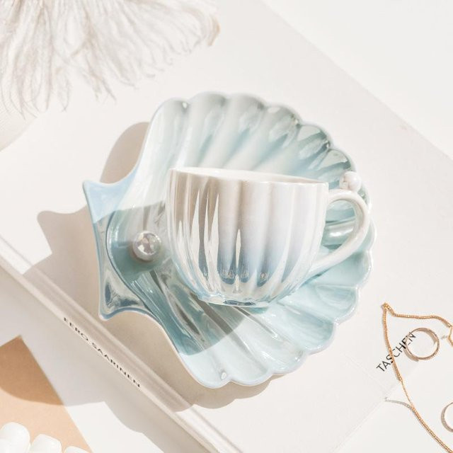 Kreatives Kaffeetassen-Set aus Keramik im Perlmuschel-Design mit Untertasse, weiß, 201-300 ml - Bild 1