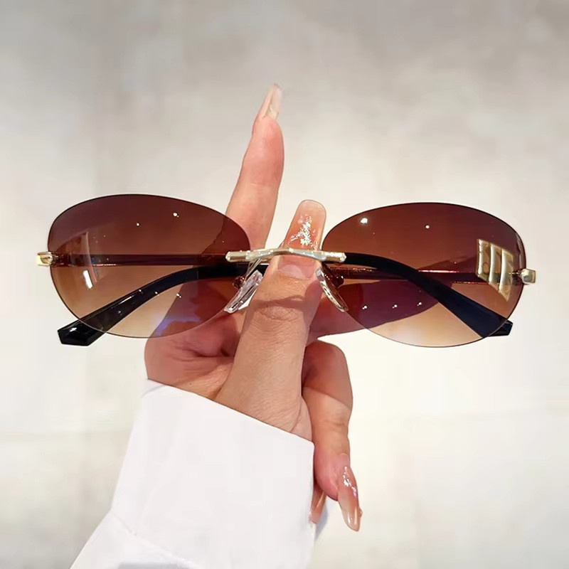 Auecmoi Sonnenbrille Cat Eye, randlos, Metall, Damen - Bild 1