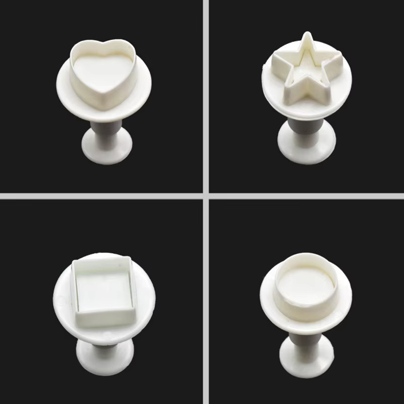 12er Set Cookie Cutter aus Kunststoff in Weiß mit geometrischen Formen wie Herz, Quadrat, Pentagramm und Kreis für deine Küche - Bild 2