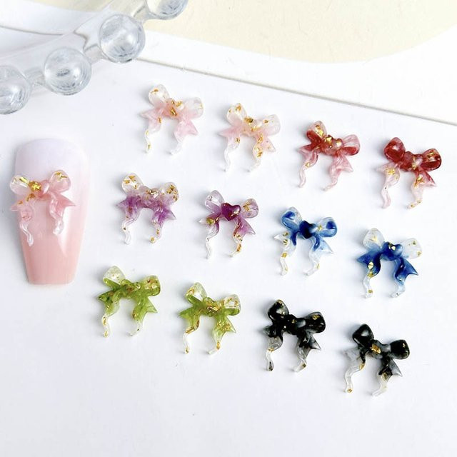 50 Stück Harzband Schleife Nagel Charms Glow-in-the-Dark, Glänzend - Bild 1