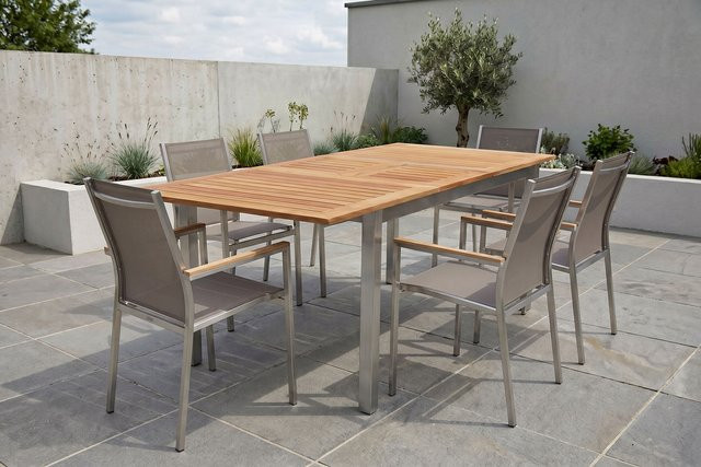 Stern Cardiff Garten-Essgruppe aus Edelstahl und Teakholz in Silber/Grau mit ausziehbarem Tisch und 6 Stapelsesseln, Tisch B/T/H: 150 x 90 x 75 cm (ausziehbar auf 200 cm) - Bild 1