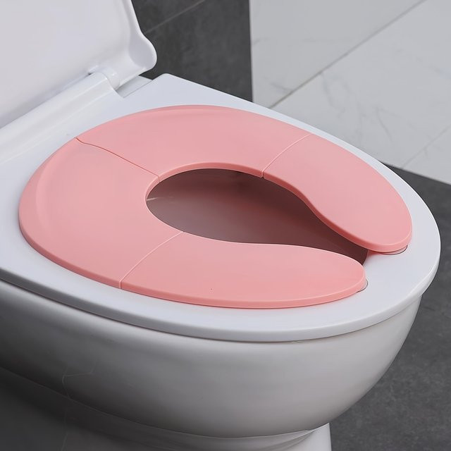 Tragbarer und zusammenklappbarer Töpfchentrainingssitz mit Saugnapf für Kinder in Pink - Bild 1