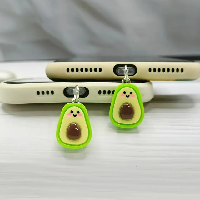 Dekorativer Avocado Staubschutz für dein Telefon in Grün mit lächelndem Design - Bild 1