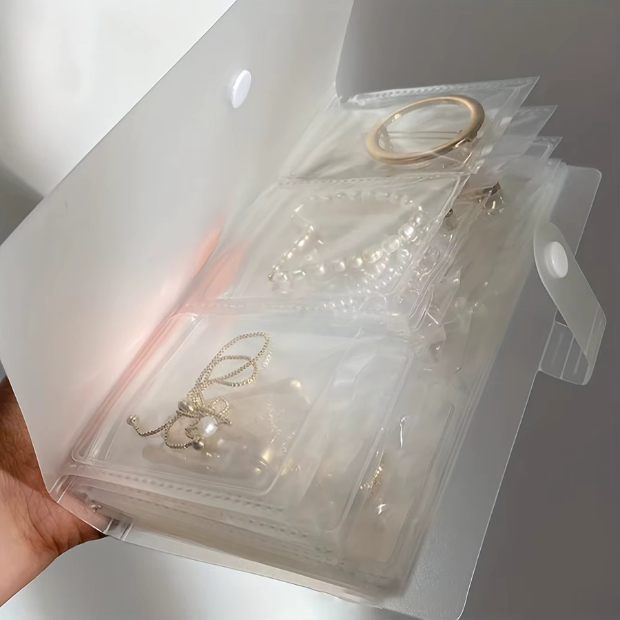 Transparentes Schmuck-Aufbewahrungsbuch mit 84 Zellen für Reisen und Organisation - Bild 2