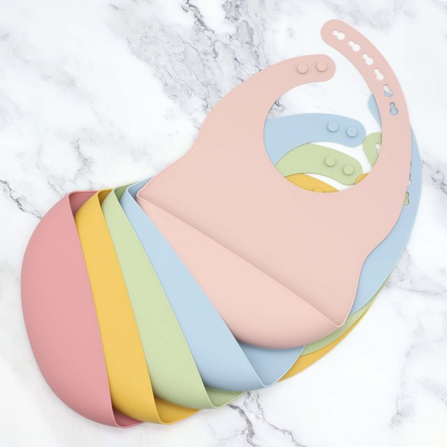 Baby-Silikon-Lätzchen mit Krümelauffangschale in Pink und Multicolour, faltbar und spülmaschinenfest - Bild 1