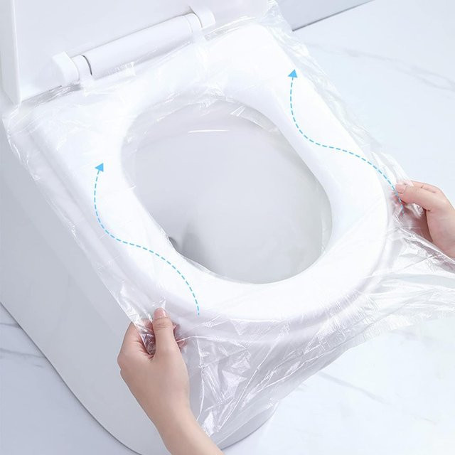 100 Stück Einweg Toilettensitzbezüge transparent für unterwegs und Reisen - Bild 1