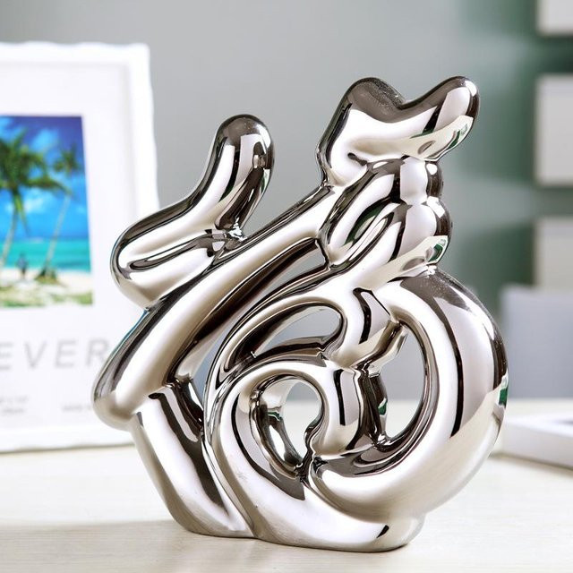Moderne abstrakte Keramik-Ornamente von Yiran Furniture in Gold und Silber zur Dekoration für Wohnzimmer und Büro - Bild 1