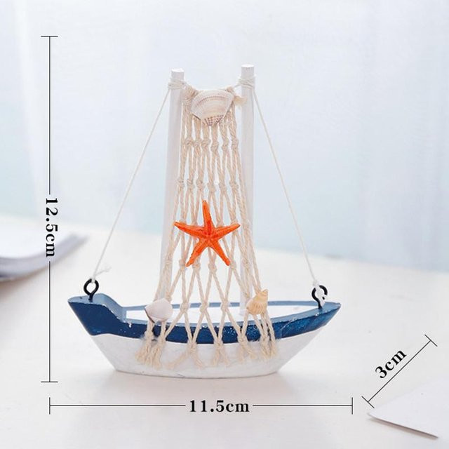 Dekorative Segelboot-Ornament im mediterranen Stil aus Holz in Blau und Weiß - Bild 1