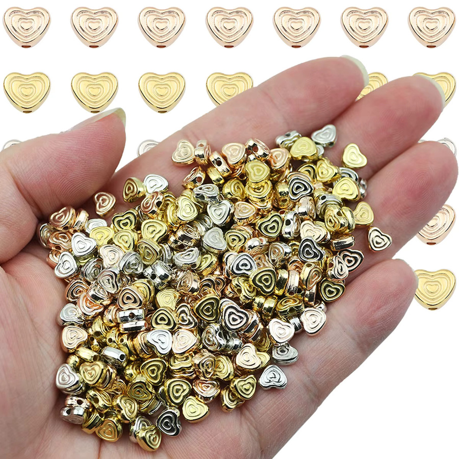 Spacer Perlen, doppelt herzförmig, 6 mm, goldene silbrige, Unisex - Bild 2