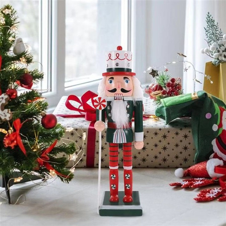 Vintage Nussknacker Figur aus Holz als weihnachtliches Deko-Ornament in Multicolor