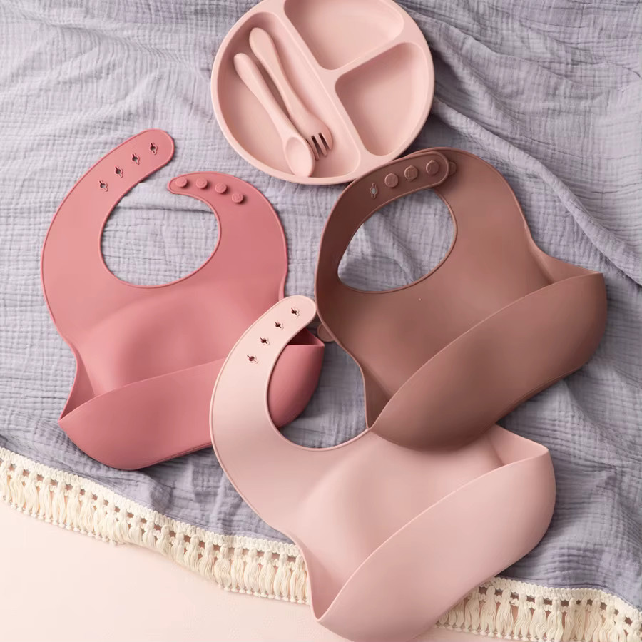 2er-Set Baby Silikon Lätzchen mit Krümelauffang in Pink, wasserdicht und waschbar - Bild 1