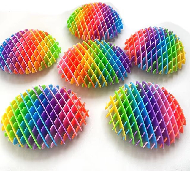Meade Regenbogen elastischer Mesh Verformung Wurm, sensorisches Puzzle Spielzeug - Bild 1