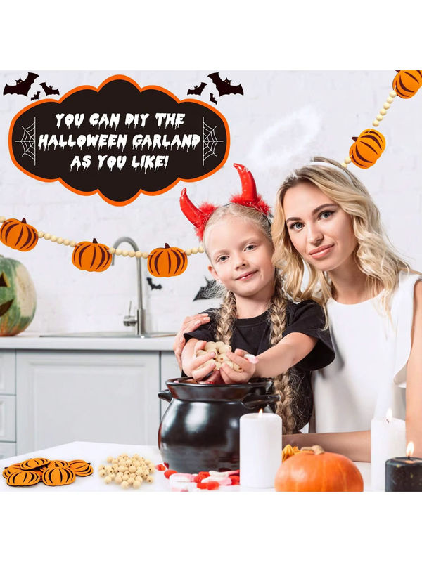Halloween-Kürbis-Girlande aus Holzperlen und Filz in Orange als herbstliche Wanddekoration für dein Zuhause - Bild 3