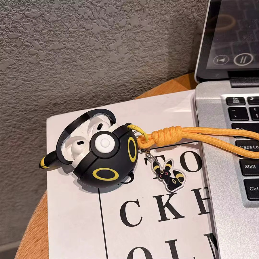 Schutzhülle für AirPods in Schwarz mit niedlichem 3D-Cartoon-Design und Schlüsselanhänger - Bild 3