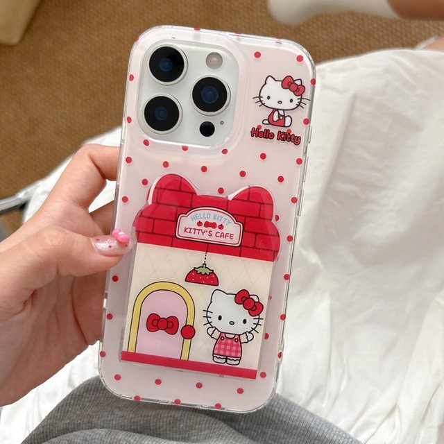Sanrio Hello Kitty Handyhülle mit Polka-Dot-Design und Klappspiegel-Ständer für iPhone 17, 16, 15, 14 Pro Max und 17 Pro, Farbe: Rot - Bild 1