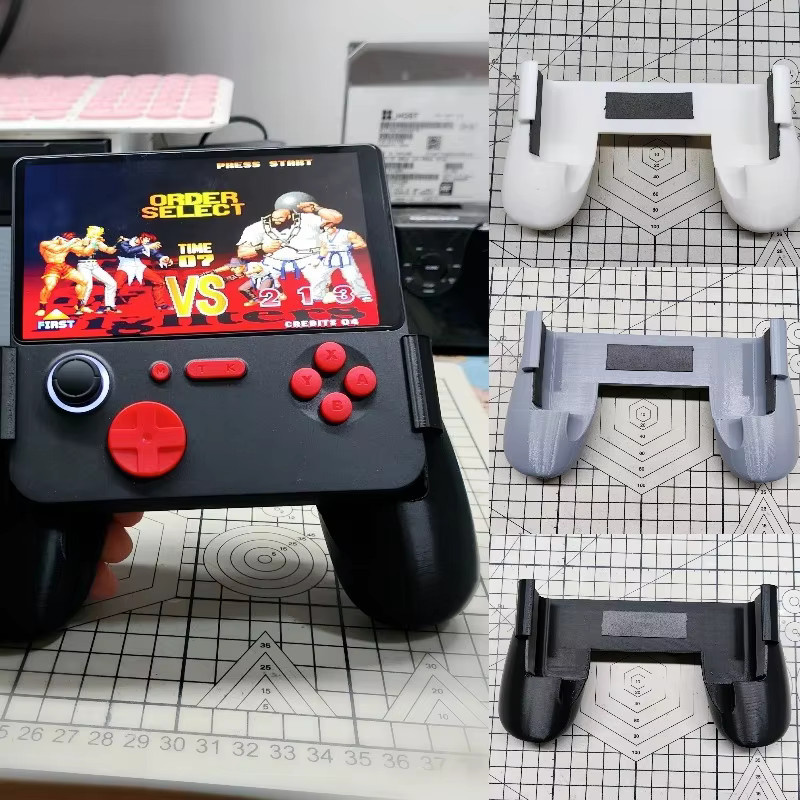 GAMEMT E5 Plus Gamepad Palm Grip Hand Grip in Schwarz - Bild 1