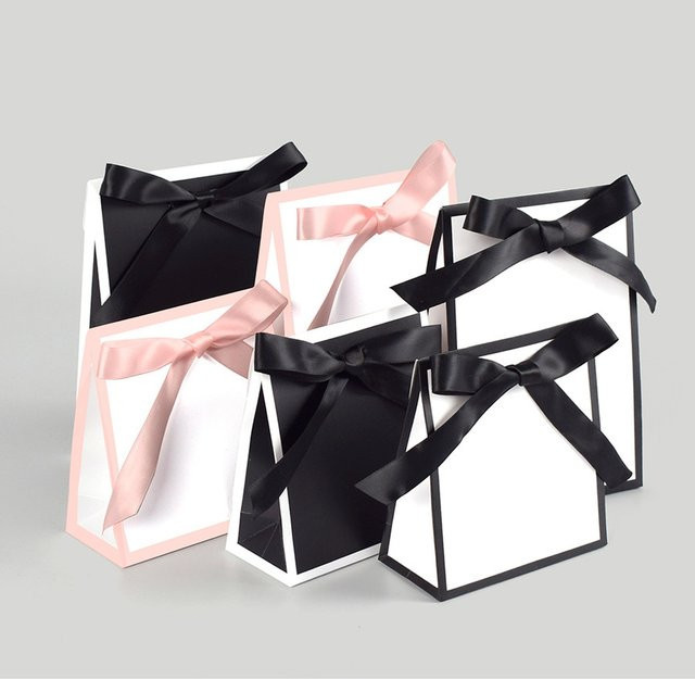 10 Stück Geschenkverpackungsbeutel aus Textil in Schwarz-Weiß mit Schleifen-Design - Bild 1