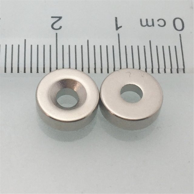 XICIMAG Runder Magnet mit Löchern in Silber für Kühlschrank, Schranktüren und Whiteboards - Bild 1