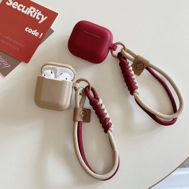 Silikonhülle für Apple AirPods 4, 3, Pro und 2 mit geflochtenem Umhängeband - Bild 1