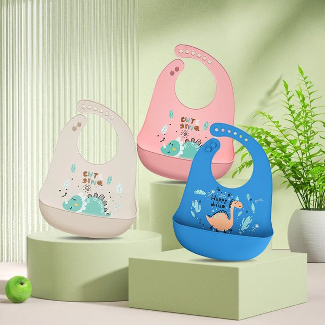 Wasserdichtes Baby Lätzchen aus Silikon mit Dinosaurier-Print in Blau, verstellbar und waschbar - Bild 1