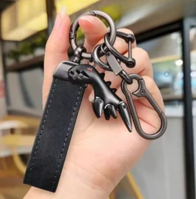 SAISLERWELL Schlüsselanhänger Dinosaurier, Leder Geflecht, Unisex - Bild 1